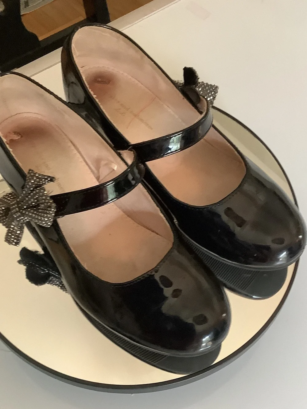 cupcakes & cashmere Black Patent Mary Jane Wedges with Embellished Bow